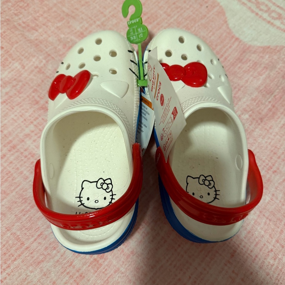 CROCS Kids White Hello Kitty Clogs with Red Strap and Blue Outsole